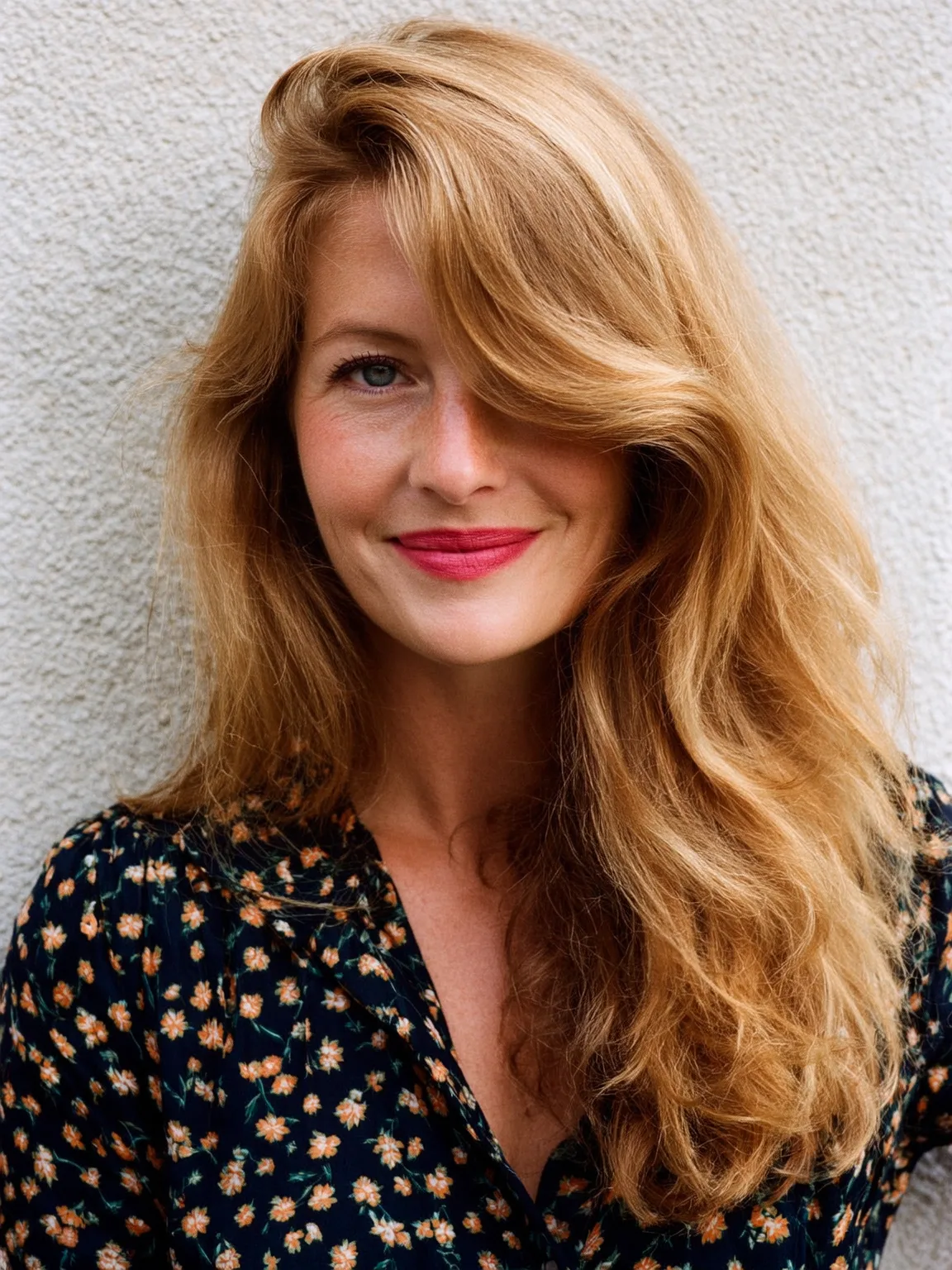 Warm Golden Blonde Wavy Layers with Side-Swept Fringe